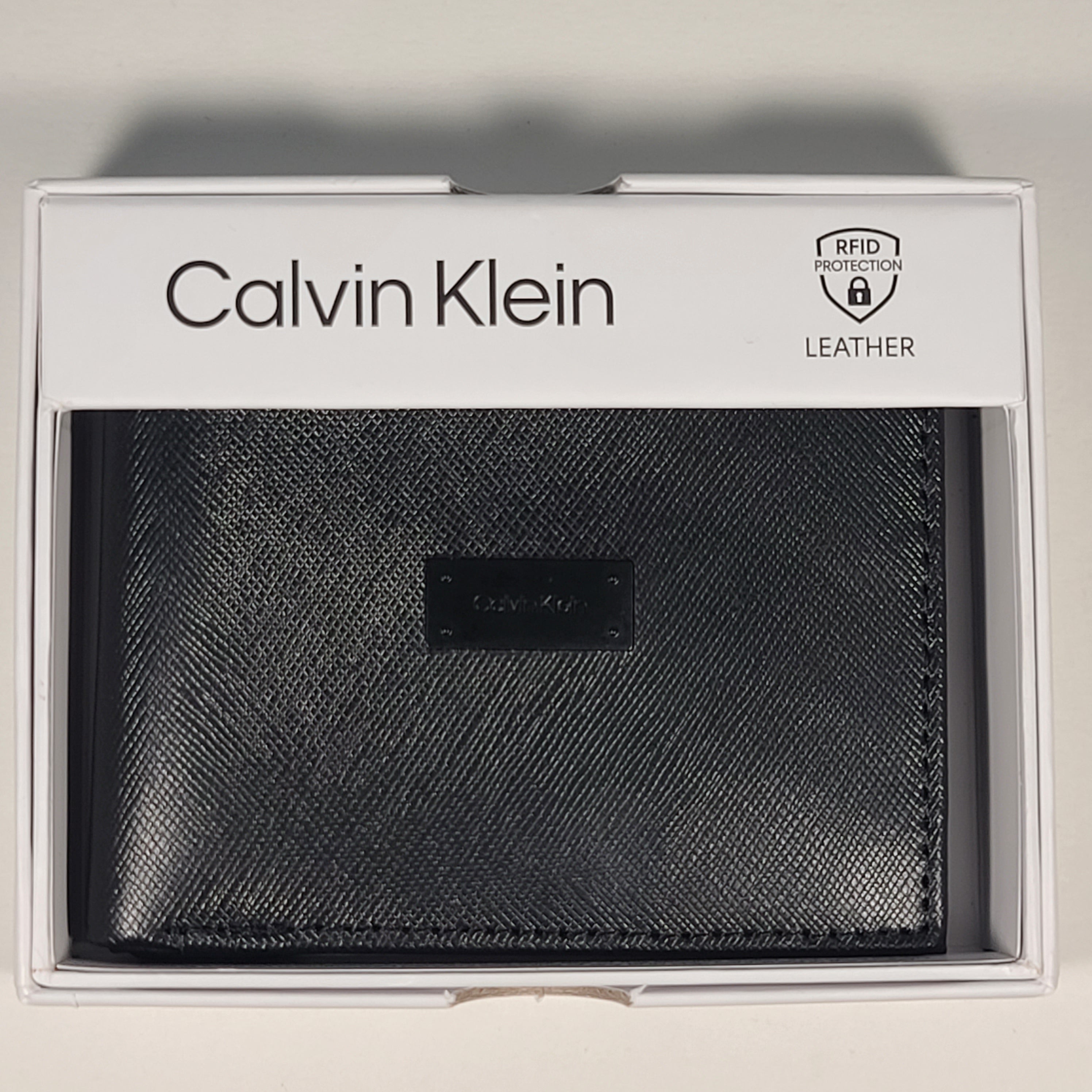 Calvin Klein Men s Bifold Black Leather RFID Passcase Wallet 31KA220033