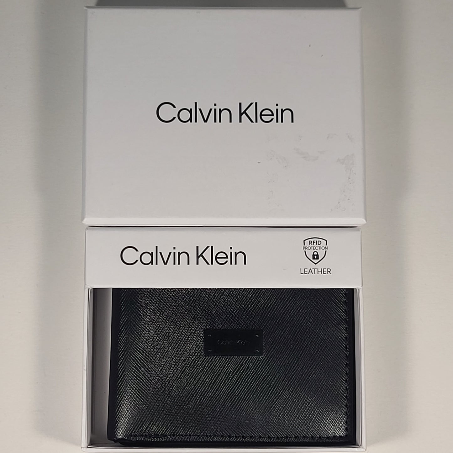 Calvin Klein Men's Bifold Black Leather RFID Passcase Wallet 31KA220033