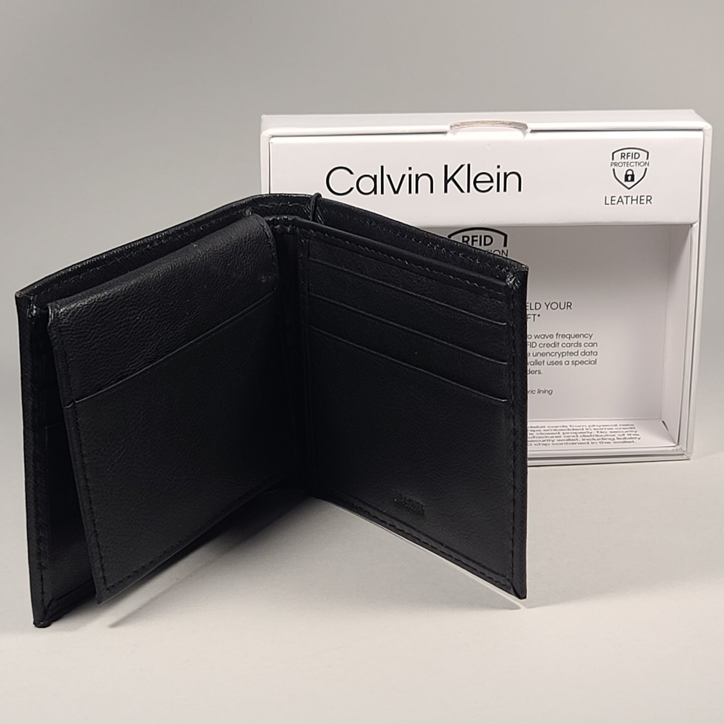 Calvin Klein Men's Bifold Black Leather RFID Passcase Wallet 31KA220033