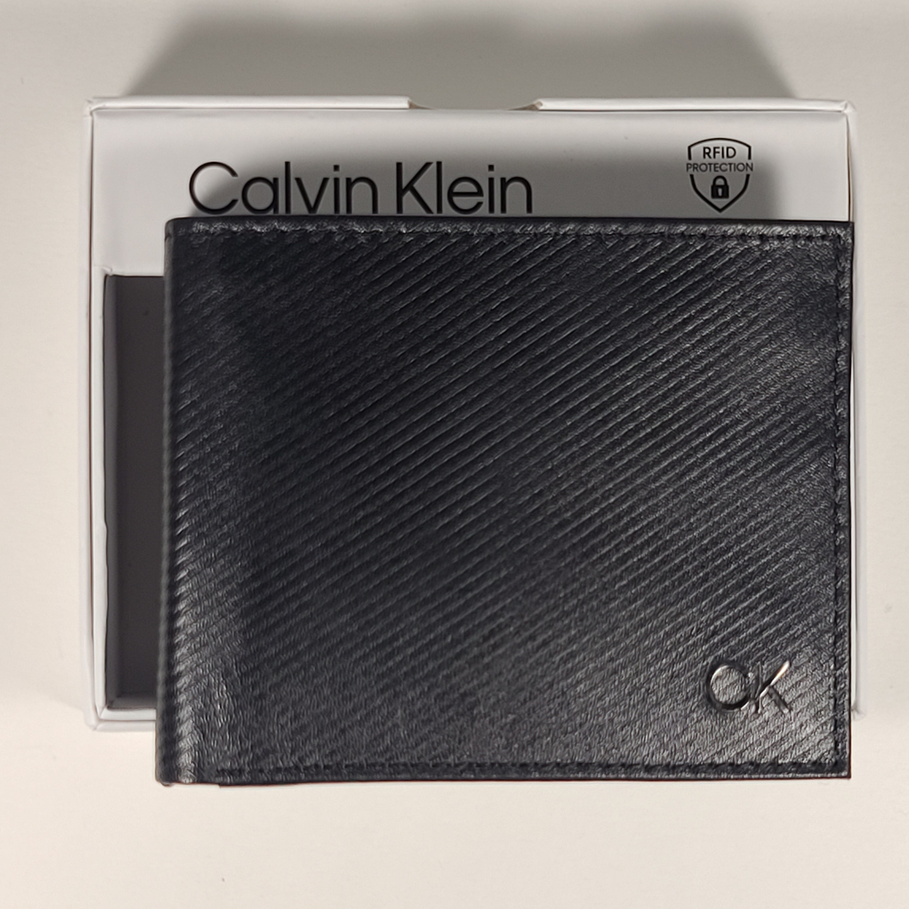 Calvin Klein Men s Bifold Black Leather RFID Passcase Wallet 31KA220037