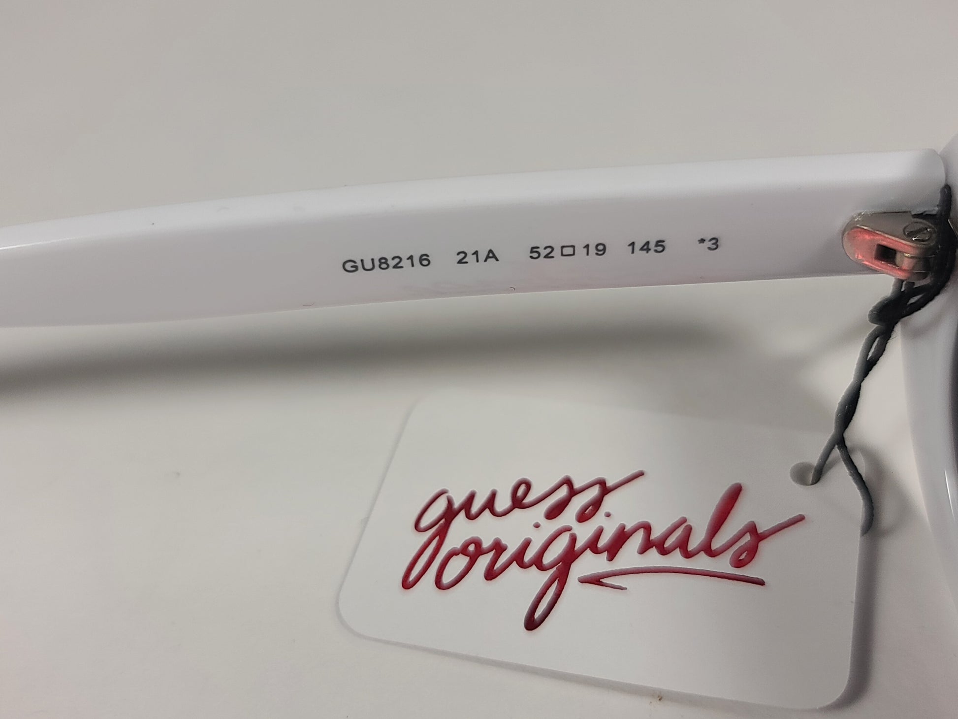 Guess Originals Small Oval Sunglasses White Frame Gray Lens GU8216 21A - Sunglasses