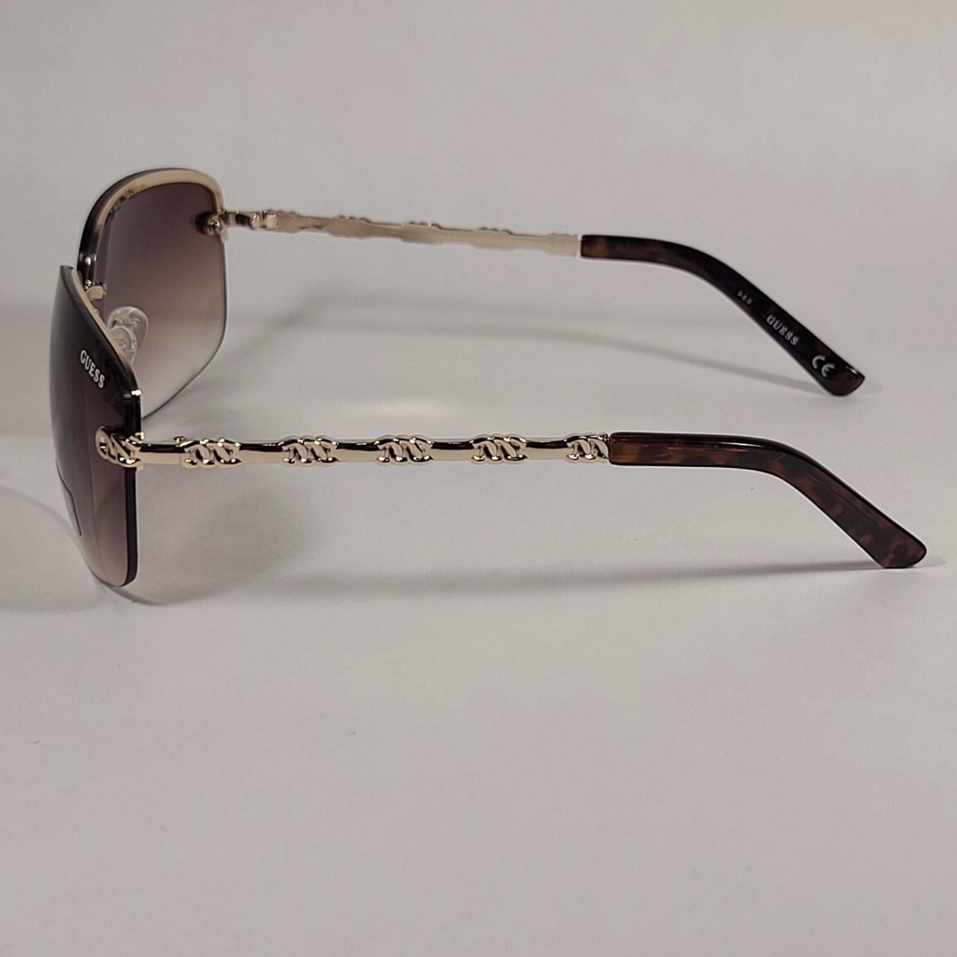 Guess Rimless Sunglasses Gold Tone Frame Metal Brown Gradient Lens GF0388 32F - Sunglasses