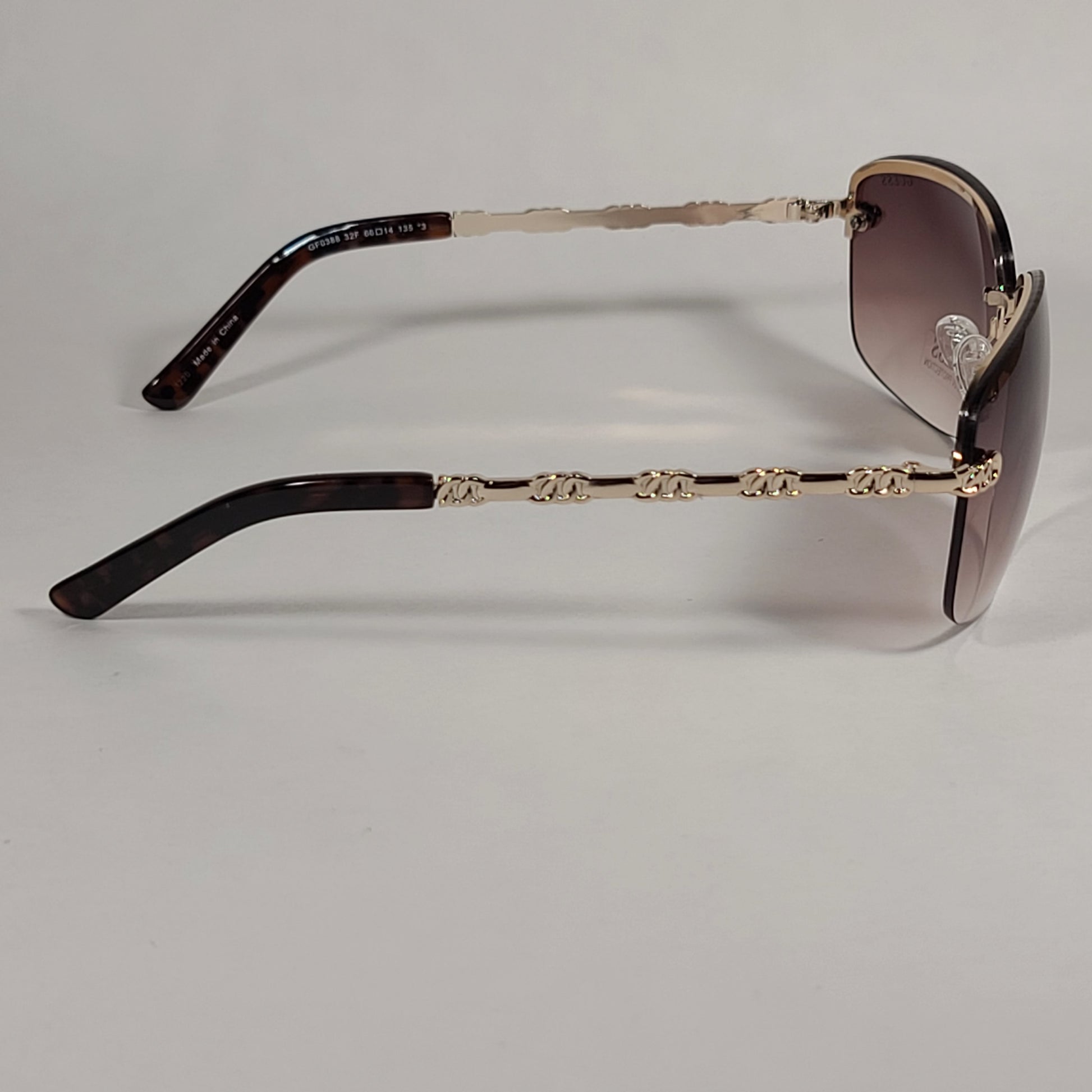 Guess Rimless Sunglasses Gold Tone Frame Metal Brown Gradient Lens GF0388 32F - Sunglasses