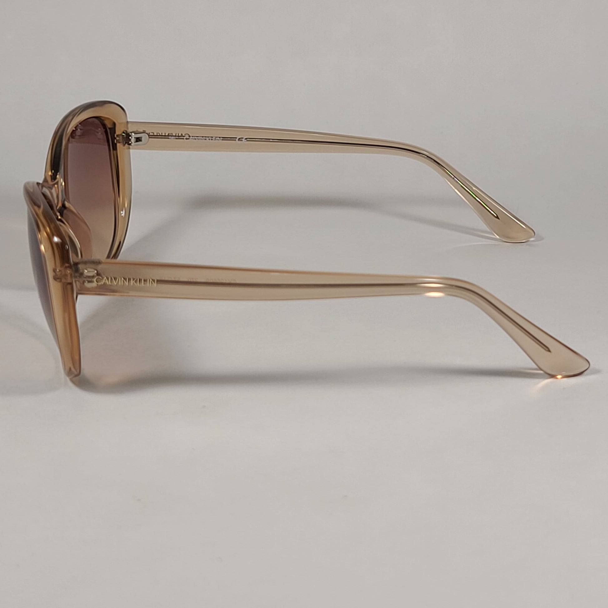 Calvin Klein Cat Eye Sunglasses CK19560S 270 Tan Crystal Brown Gradient Lens - Sunglasses