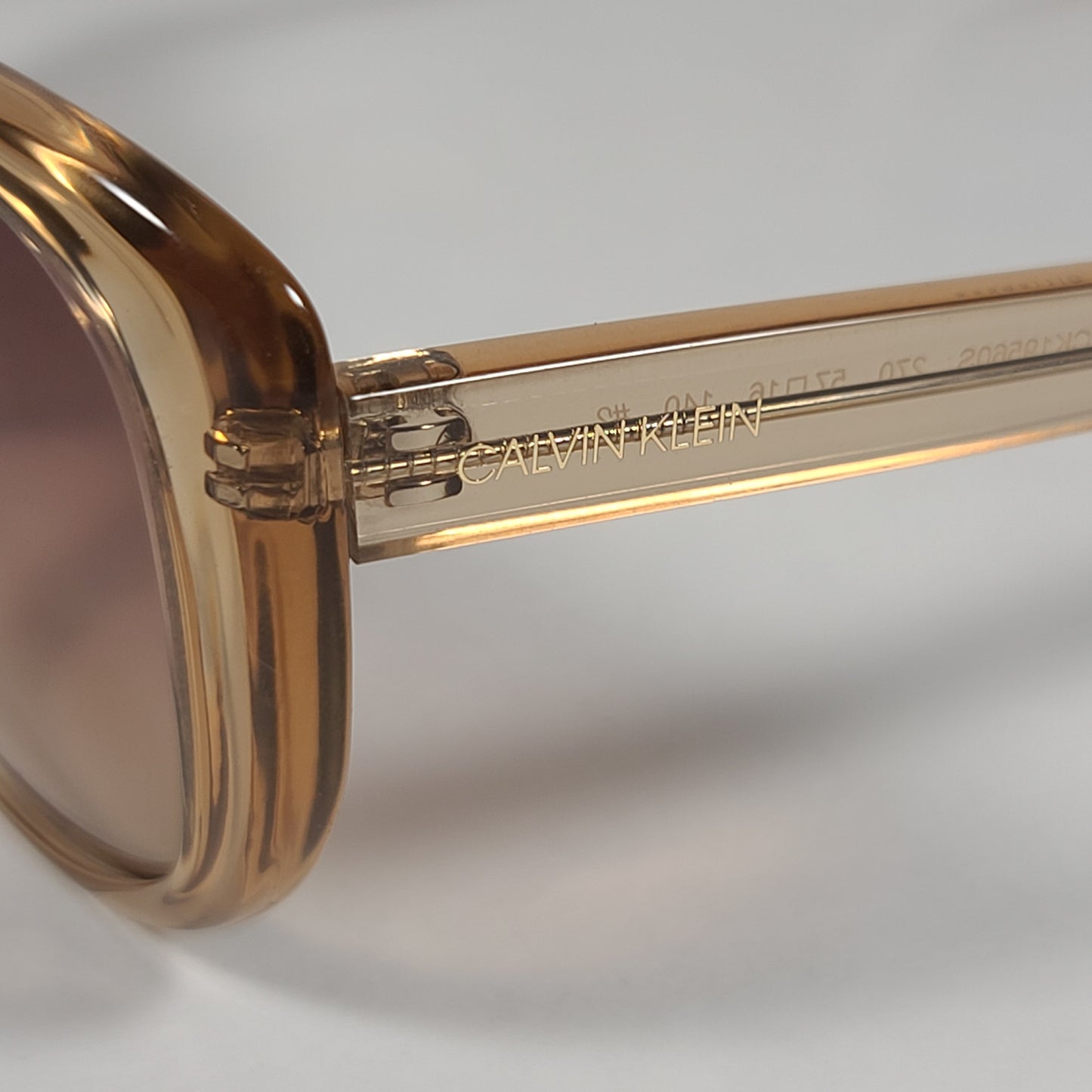 Calvin Klein Cat Eye Sunglasses CK19560S 270 Tan Crystal Brown Gradient Lens - Sunglasses