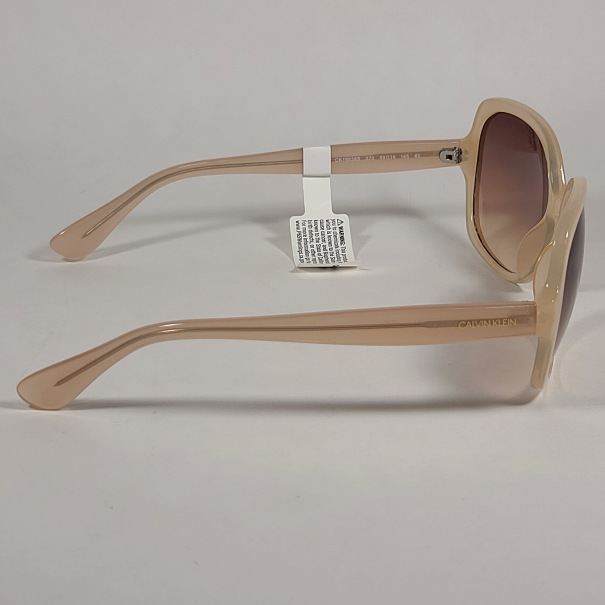 Calvin Klein Oversize Sunglasses CK19538S 270 Beige Nude Frame Brown Gradient Lens - Sunglasses