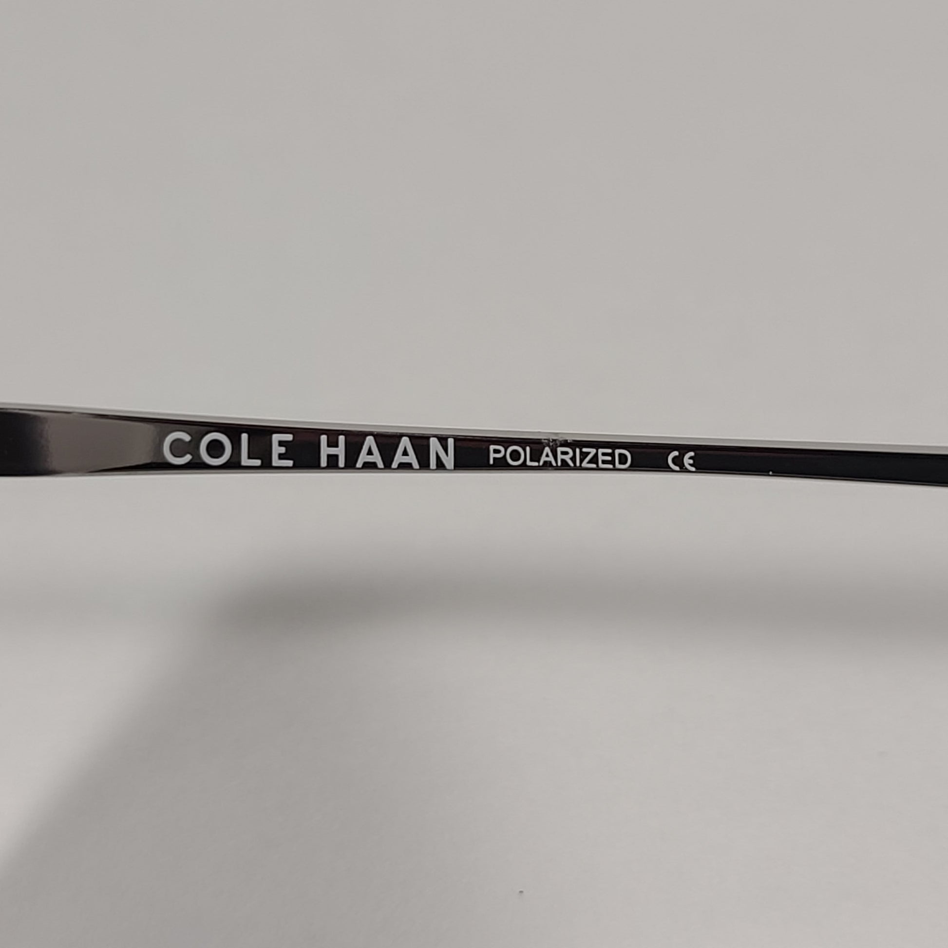 Cole Haan CH8507 971 Polarized Key Hole Sunglasses Matte Crystal And Silver Frame Gray Lens - Sunglasses