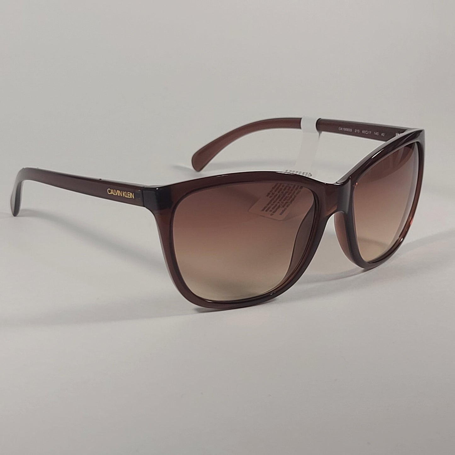 Calvin Klein CK19565S 210 Cat Eye Sunglasses Brown Frame Brown Gradient Lens - Sunglasses