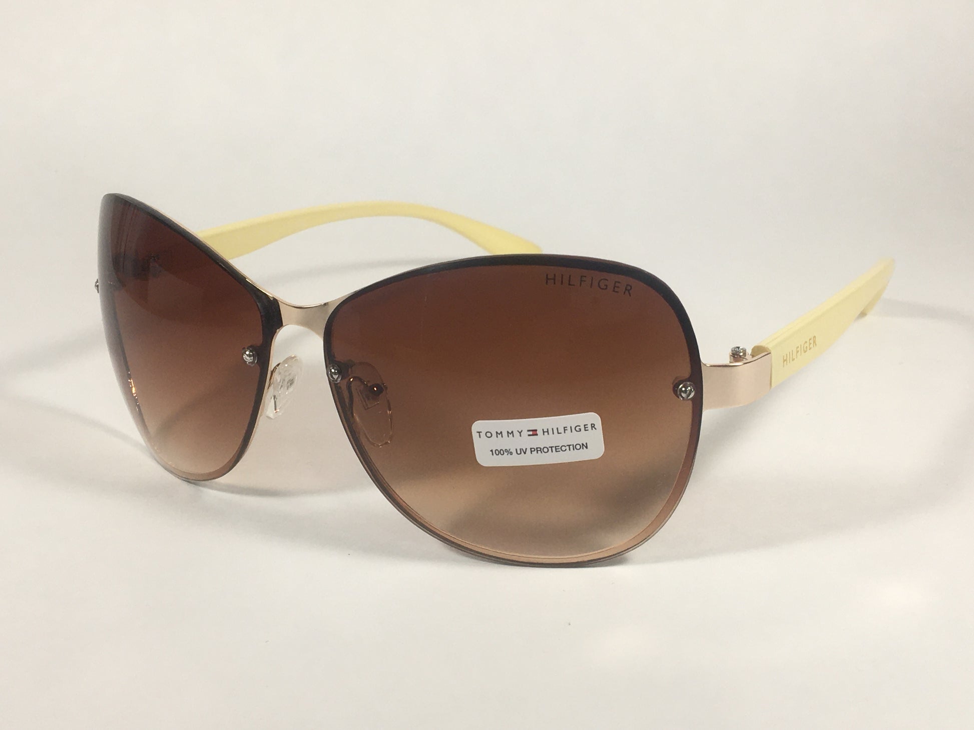 Tommy Hilfiger Melone Rimless Butterfly Sunglasses Gold Cream Frame Brown Gradient Lens MELONE WM OL78 - Sunglasses