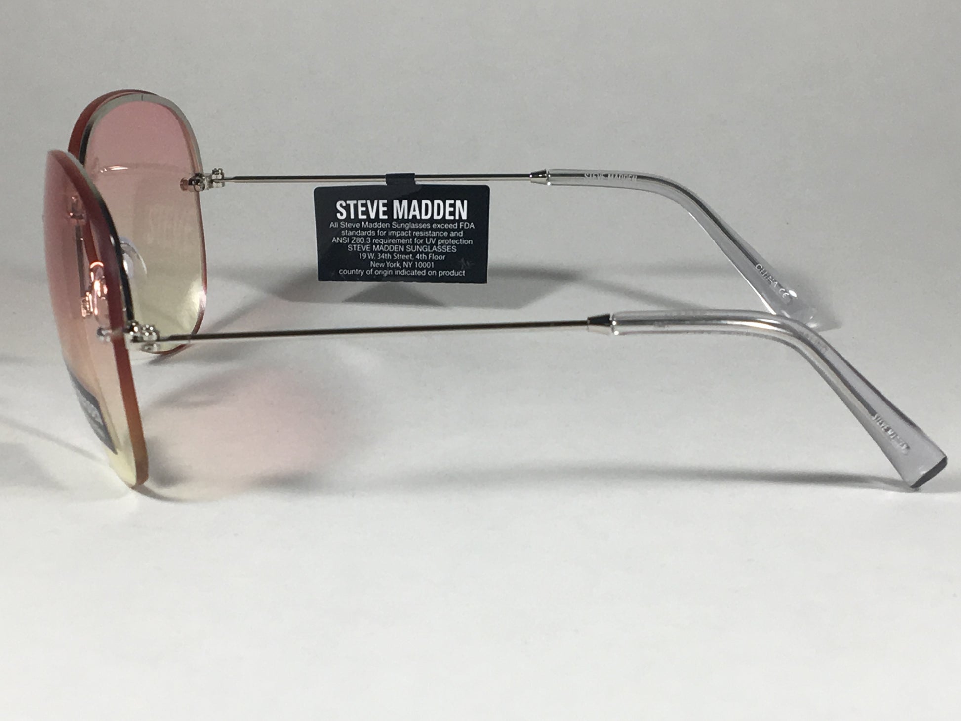 Steve Madden Rimless Aviator Sunglasses Silver Metal Frame Orange Yellow Clear Ocean Lens Sm482103 - Sunglasses