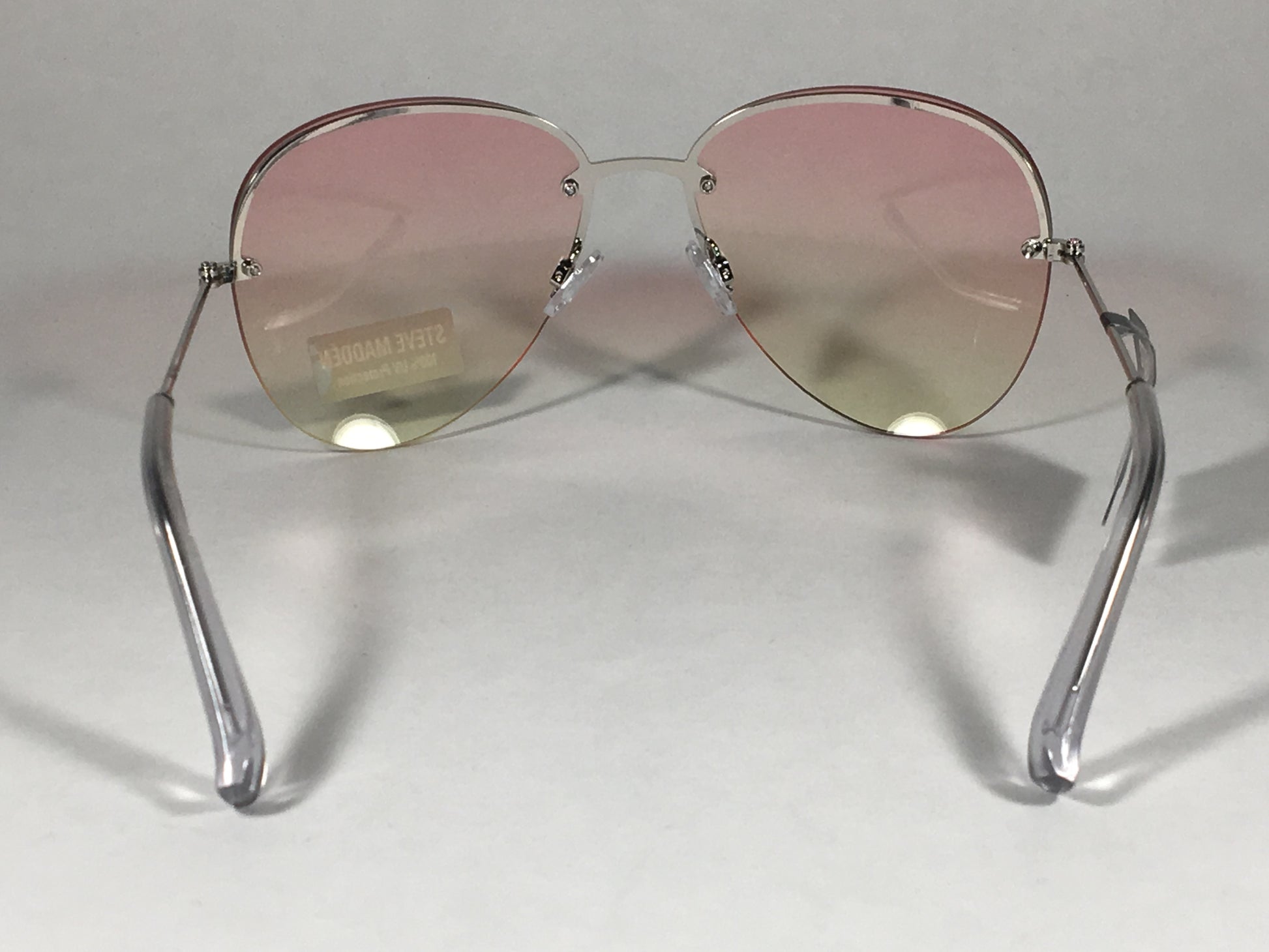 Steve Madden Rimless Aviator Sunglasses Silver Metal Frame Orange Yellow Clear Ocean Lens Sm482103 - Sunglasses