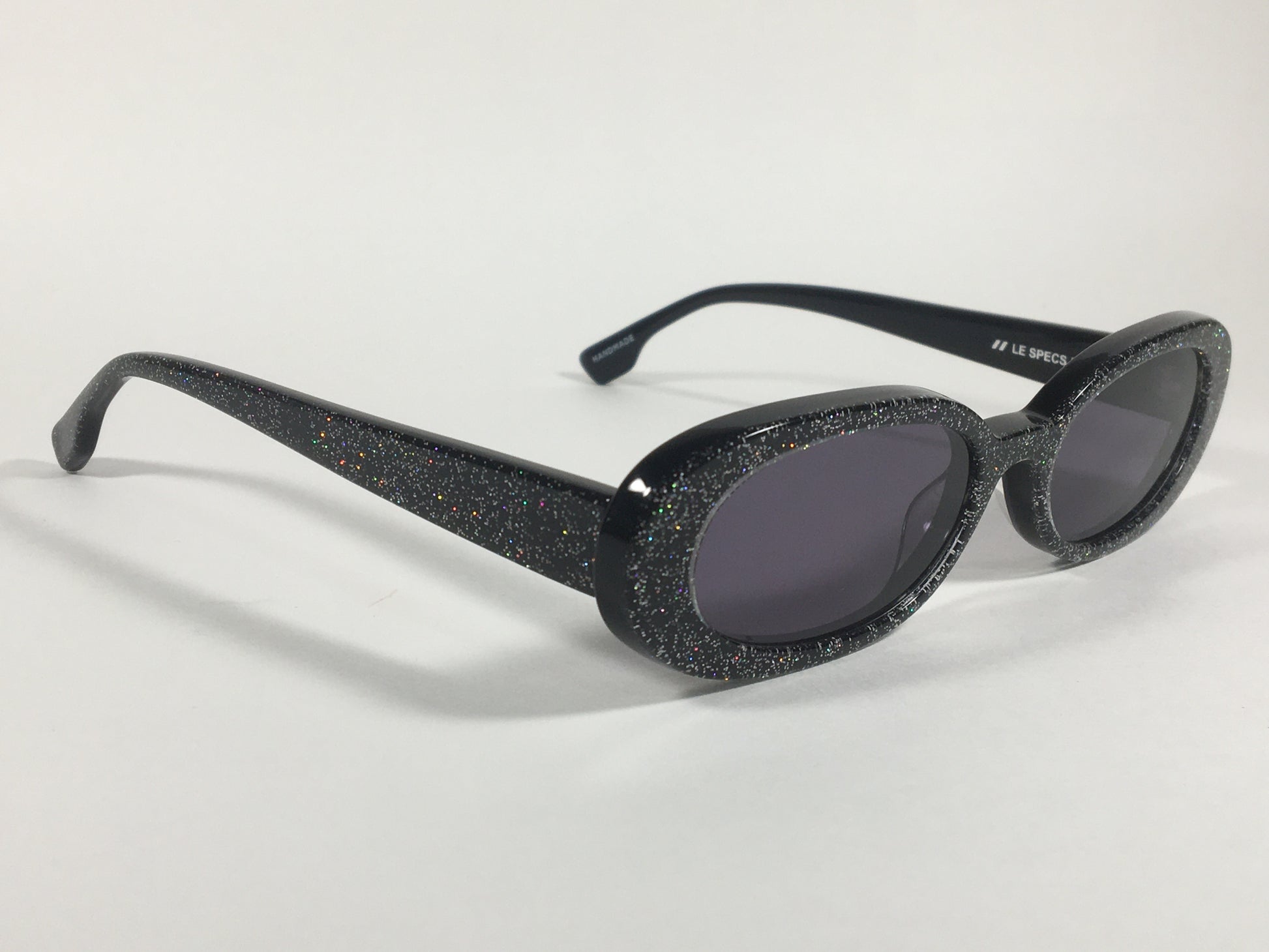 Le Specs Luxe Outcast X Nap Flat Oval Sunglasses Black Glitter Gray Lens LSL1823851 - Sunglasses