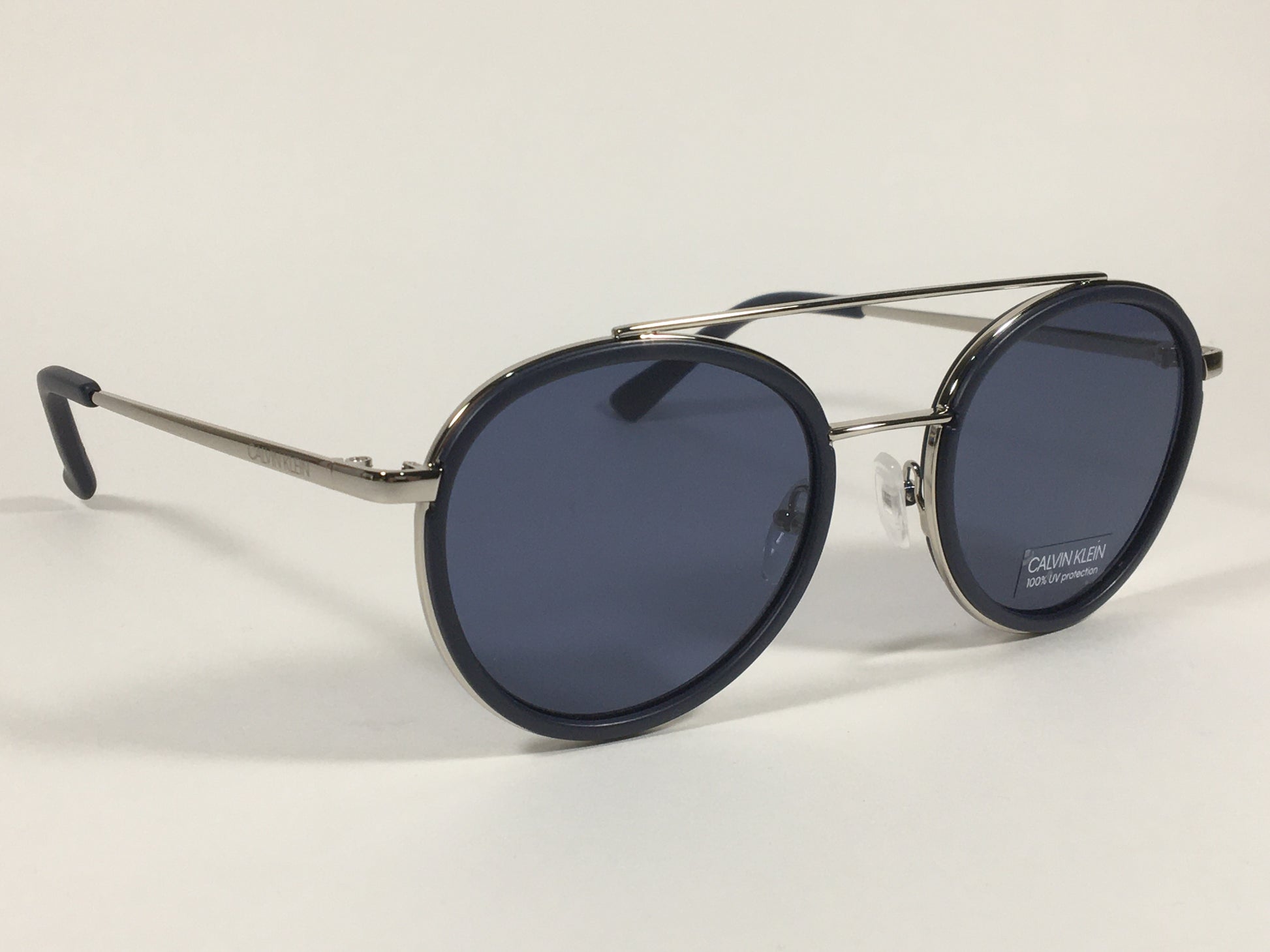 Calvin Klein CK19131S 410 Round Sunglasses Navy Blue And Silver Frame Gray Lens - Sunglasses