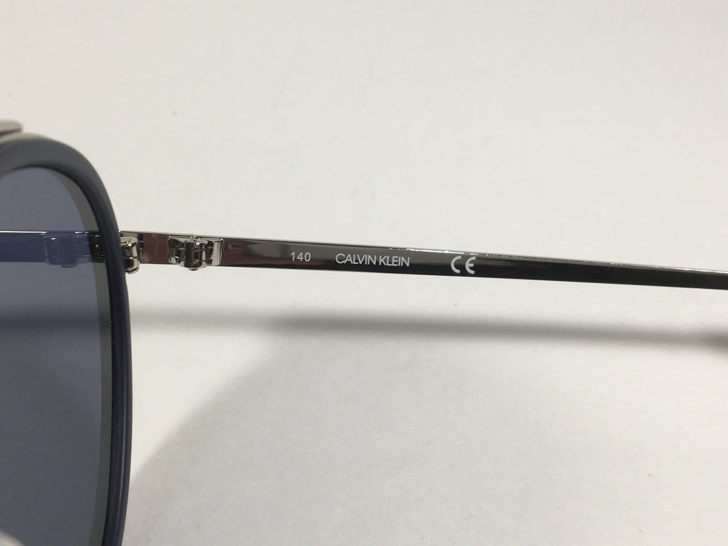 Calvin Klein CK19131S 410 Round Sunglasses Navy Blue And Silver Frame Gray Lens - Sunglasses