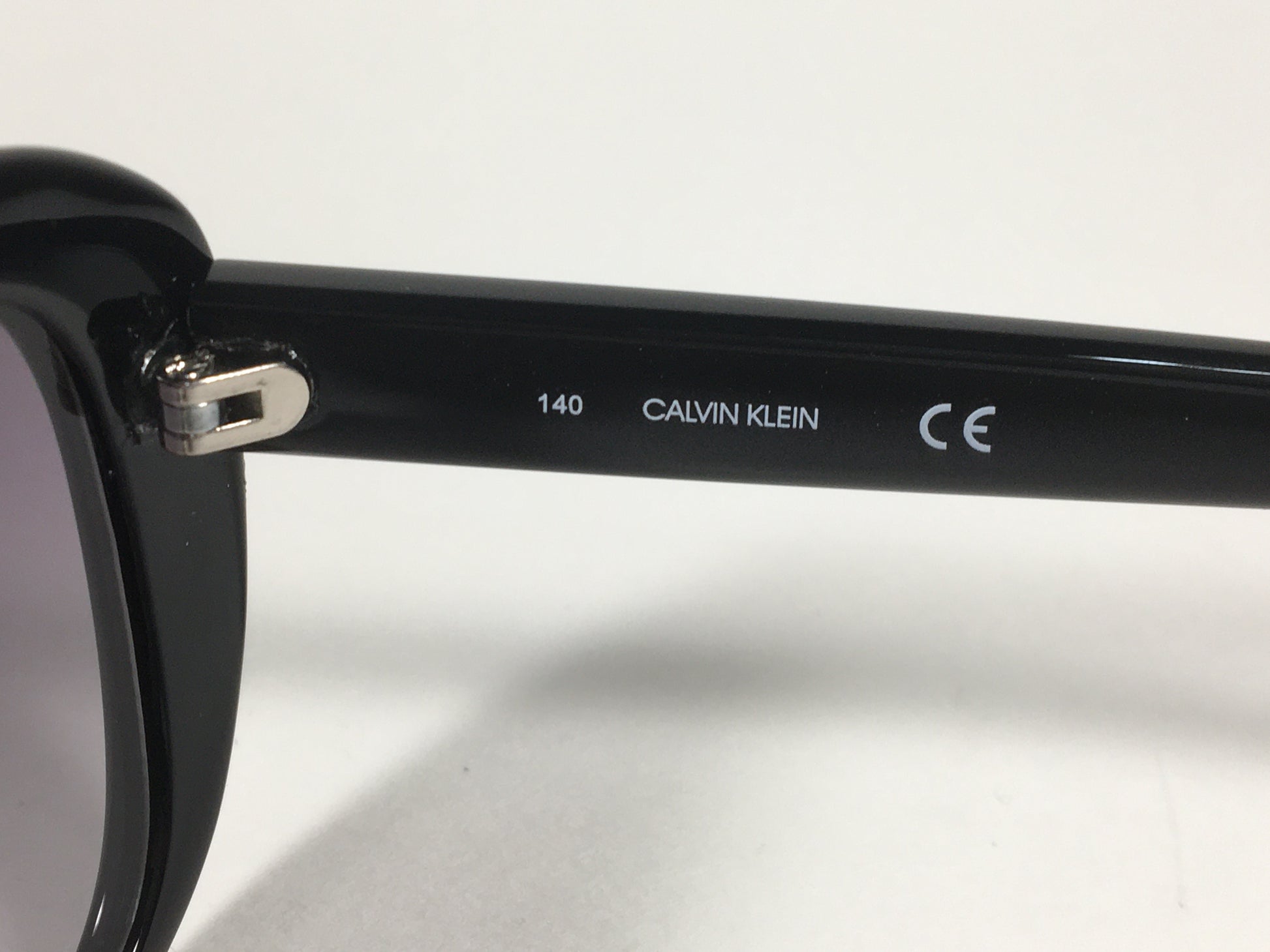 Calvin Klein Oval Sunglasses CK19541S 001 Black Gloss Frame Gray Smoke Gradient Lens - Sunglasses