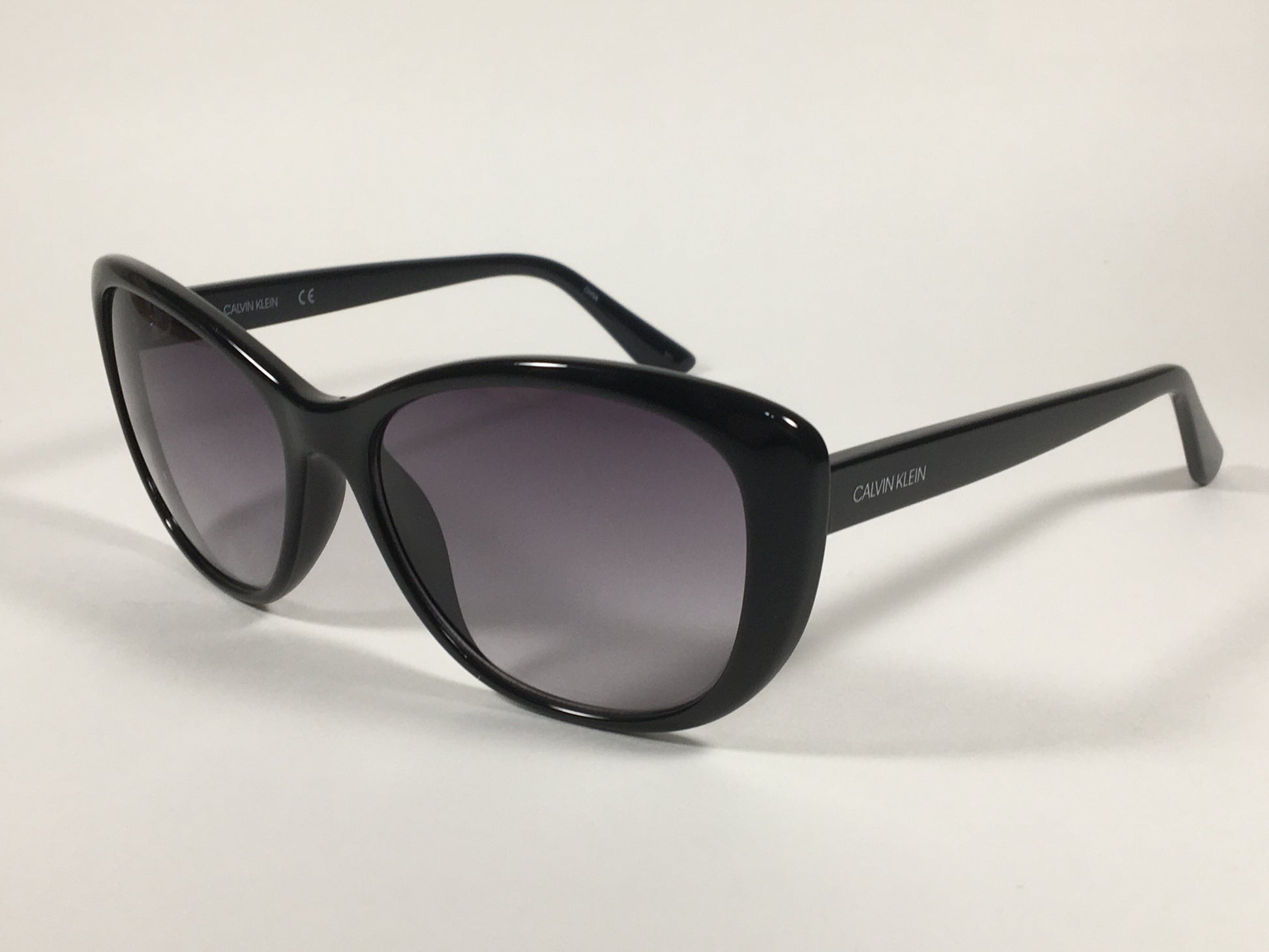 Calvin Klein Cat Eye Sunglasses CK19560S 001 Black Gloss Frame Gray Gradient Lens - Sunglasses