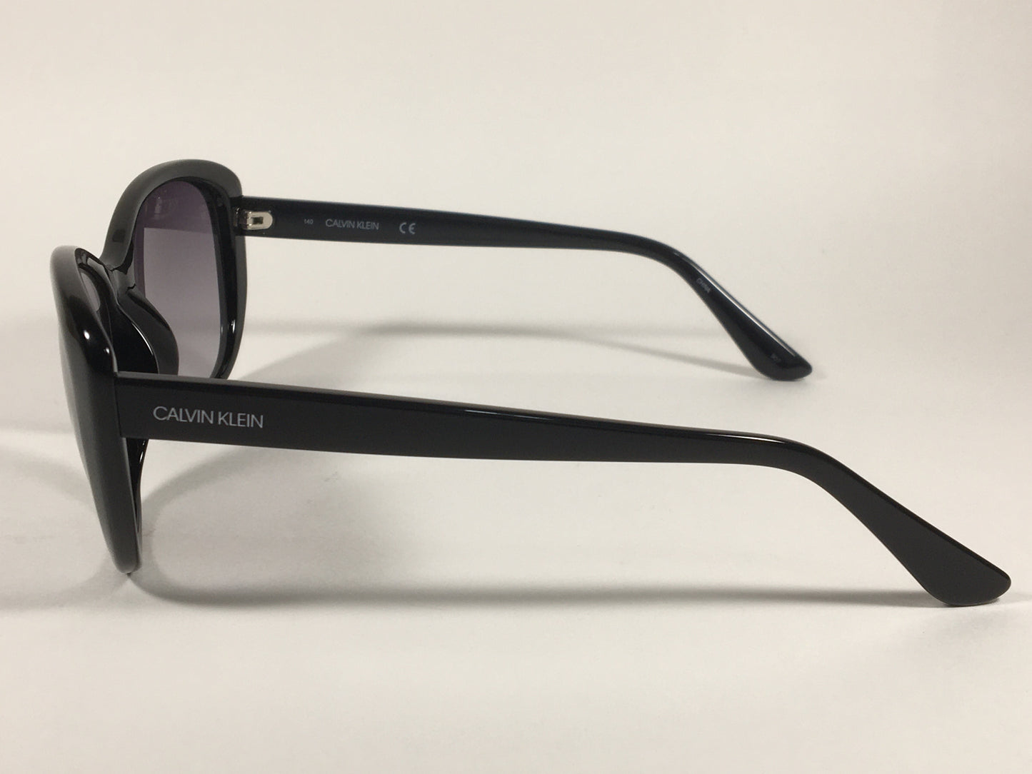 Calvin Klein Cat Eye Sunglasses CK19560S 001 Black Gloss Frame Gray Gradient Lens - Sunglasses