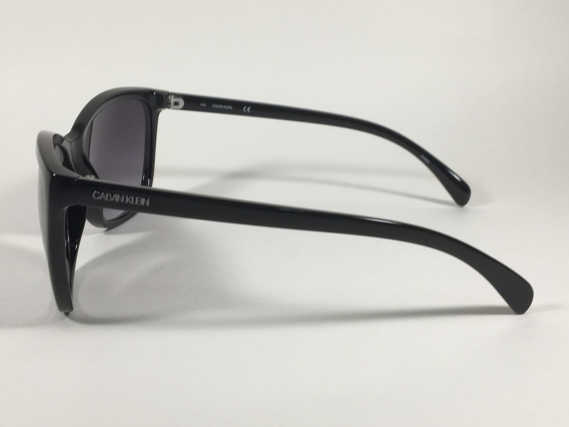 Calvin Klein Cat Eye Sunglasses CK19565S 001 Black Gloss Smoke Gradient Lens - Sunglasses