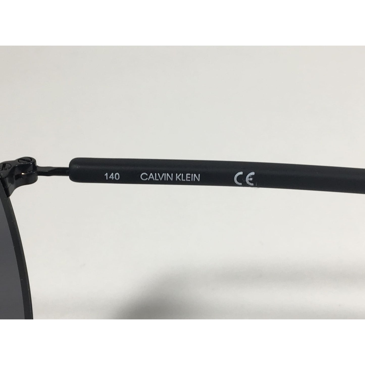 Calvin Klein CK19314S 001 Aviator Pilot Sunglasses Matte Black Metal and Plastic Frame Gray Lens - Sunglasses