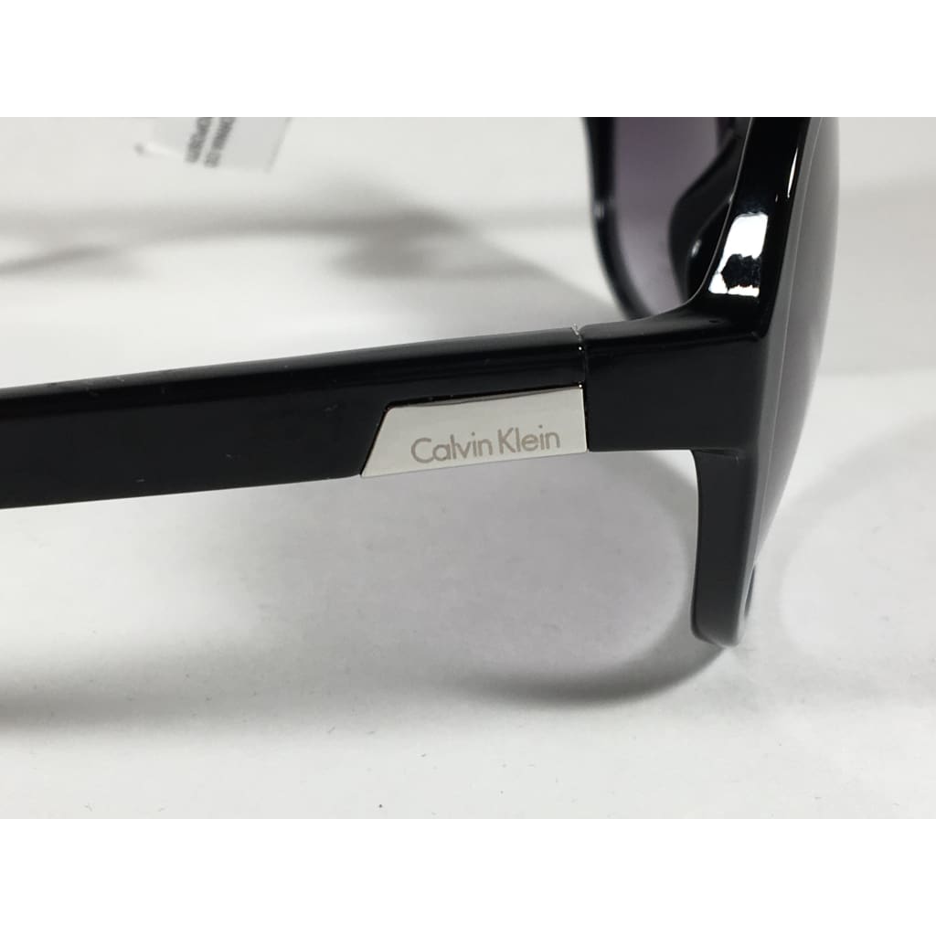 Calvin Klein R701S 001 Oval Sunglasses Black Gloss Frame Gray Gradient Lens - Sunglasses