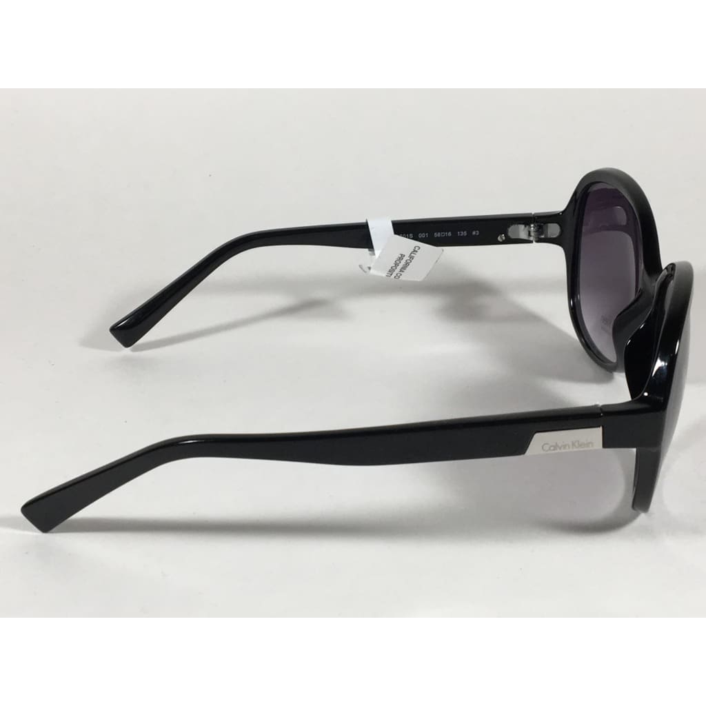 Calvin Klein R701S 001 Oval Sunglasses Black Gloss Frame Gray Gradient Lens - Sunglasses