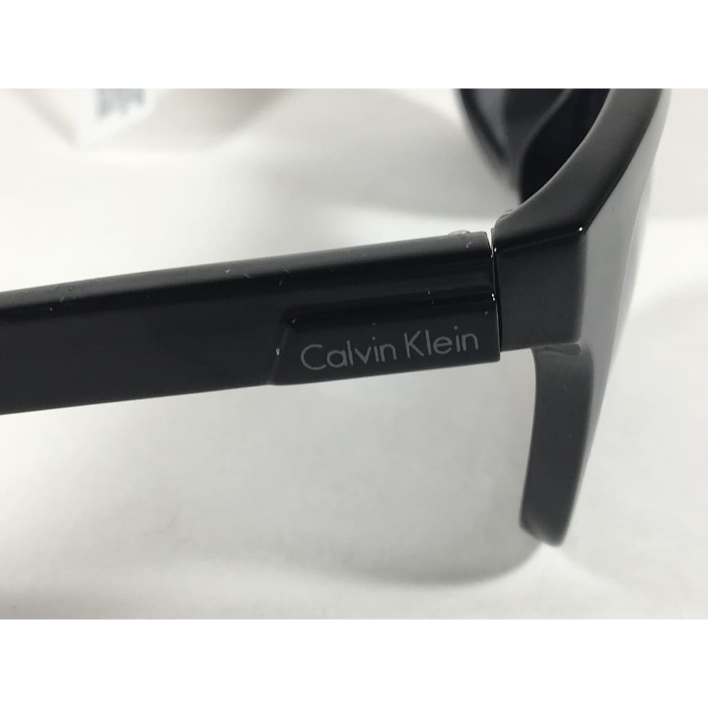 Calvin Klein R748S 001 Sleek Rectangle Sunglasses Black Gloss Gray Lens - Sunglasses