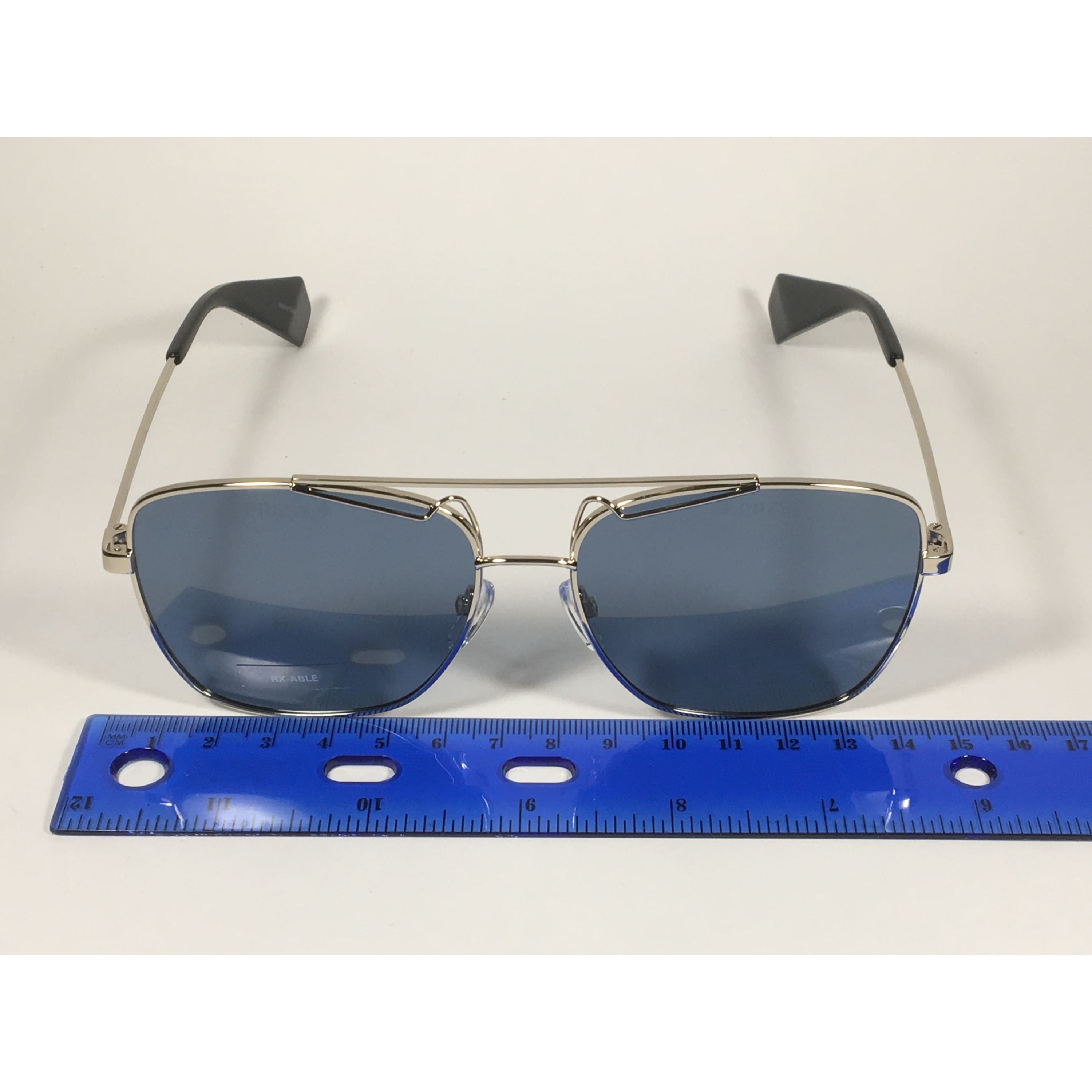 Polaroid Polarized Sunglasses Light Gold Frame Gray Blue Lens 